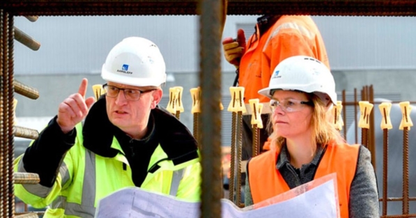 An Engineer Direction Worker While On Piling Site