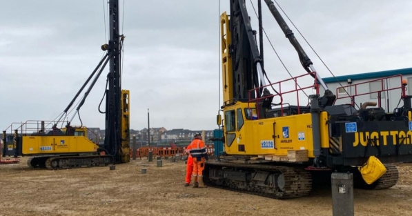Bored Piles and Driven Piles. Two Rigs on Site