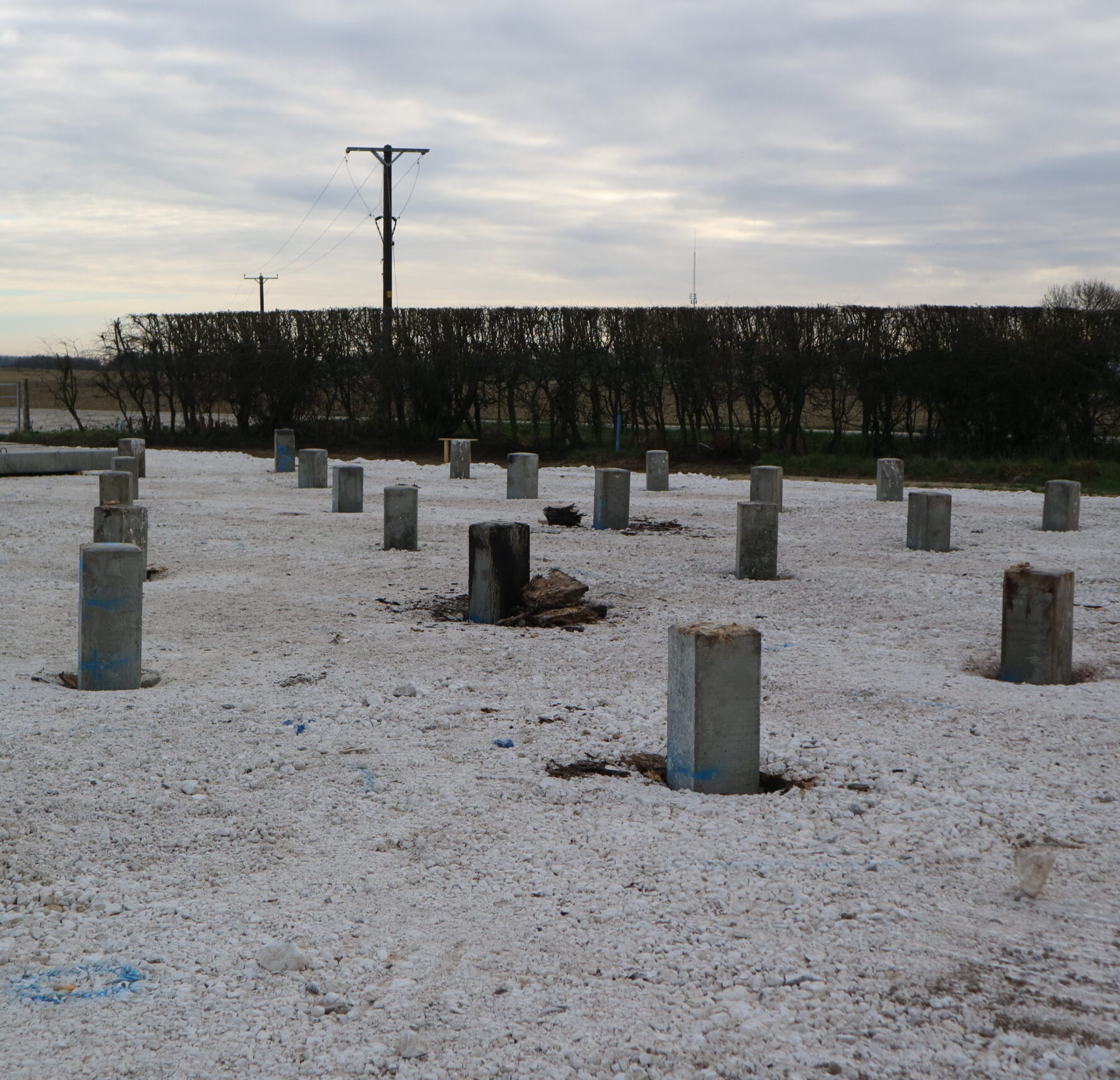 Driven precast concrete piles installed with piling mat